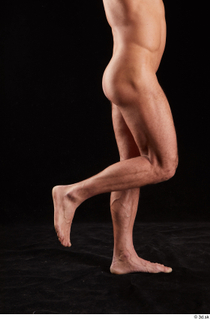 Larry Steel  1 calf flexing nude side view 0002.jpg